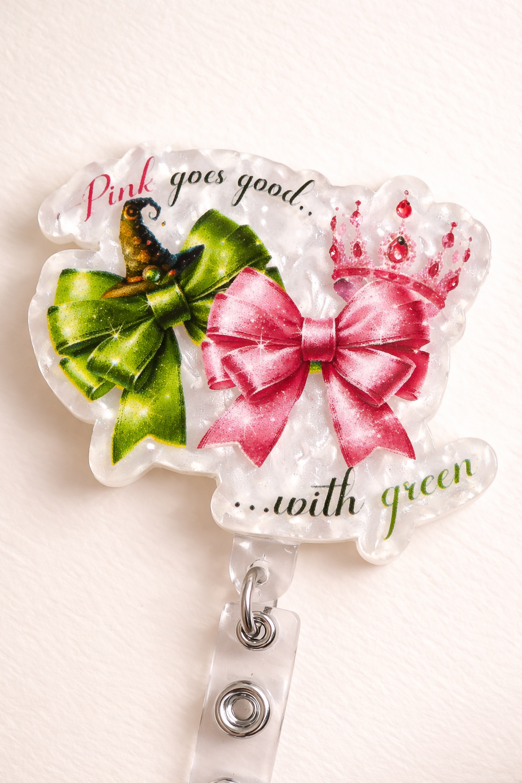 Pink Goes Good… with Green Badge Reel